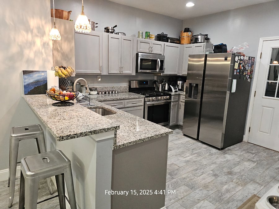 Fully equipped updated kitchen.