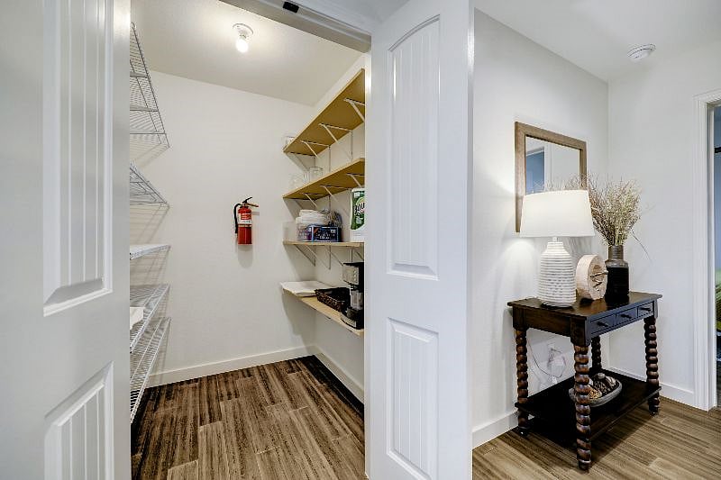 Full pantry room right off the kitchen includes gourmet espresso machine.