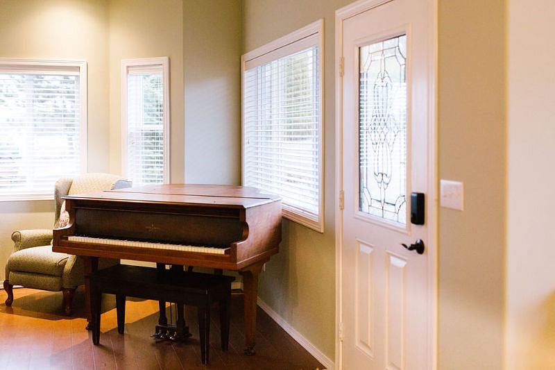 Front entry and grand piano