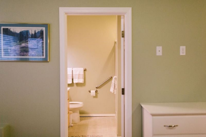 Looking into bathroom from bedroom