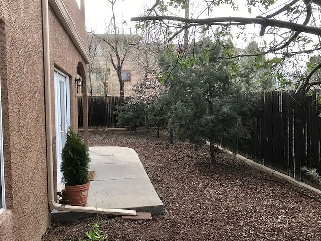 Very private. End unit. Carport right around the corner to left.