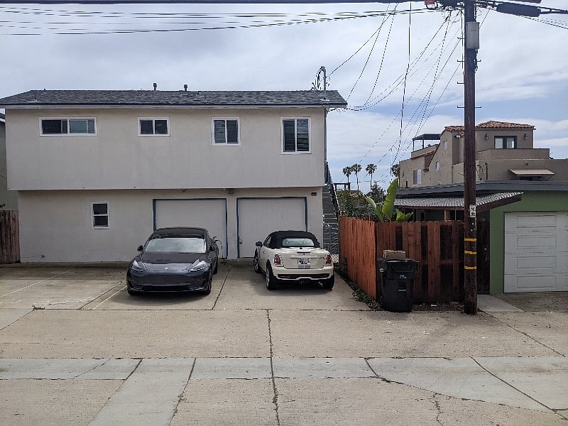 An alley parking spot is provided. The neighbor gave 1 spot. It is the third spot from the unit. Please park in the assigned spot.