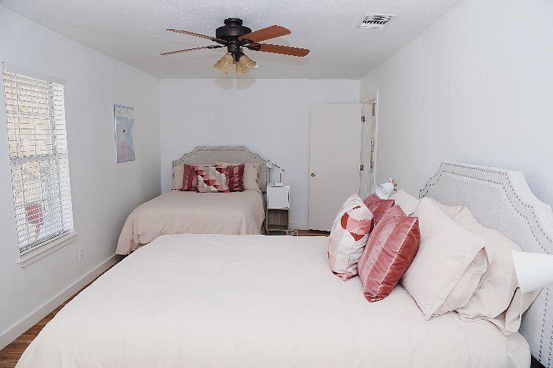 Bedroom #2 with queen and double beds