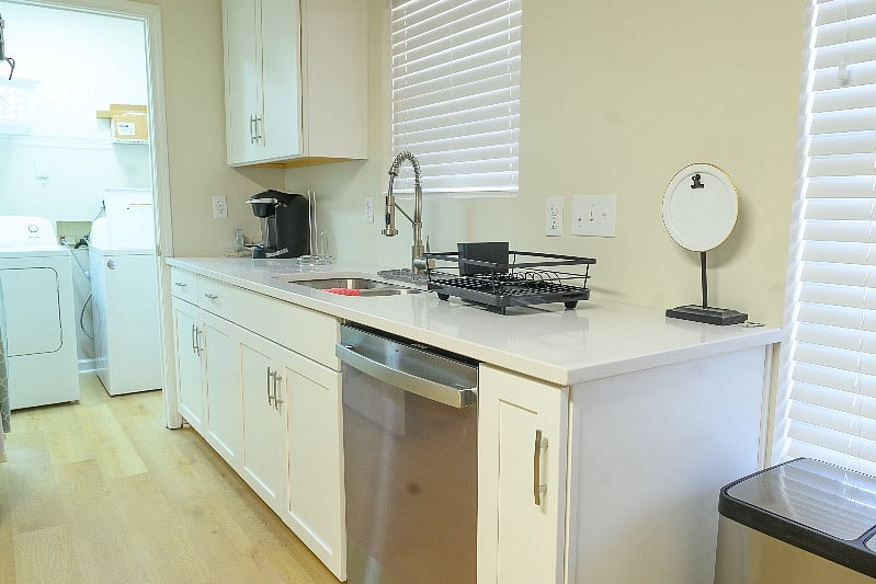 Laundry room with washer and dryer located off the kitchen.
