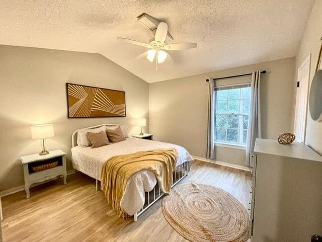Primary bedroom with 2 closets and it's own bathroom vanity