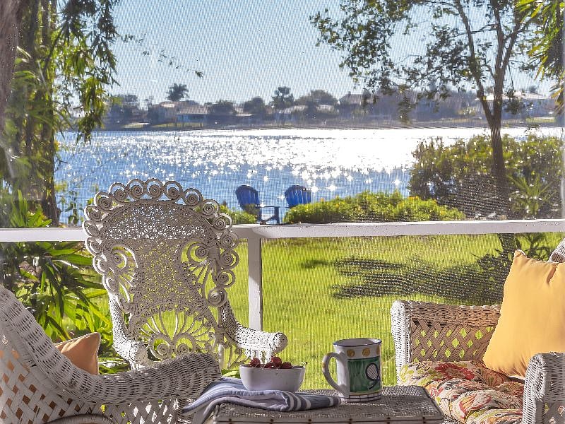 Large screened in back porch with water views