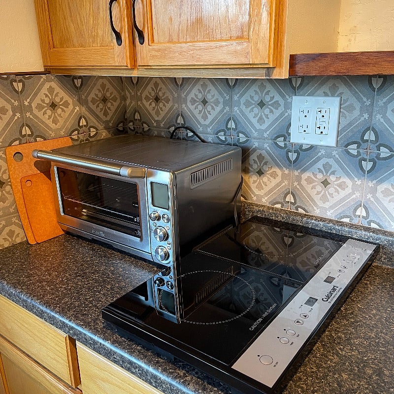 Cooking gear. The pantry to the left is full of great quality pots, pans, wok, baking, utensils, spices and cooking basics. Everything needed to make healthy dinners or lunches.