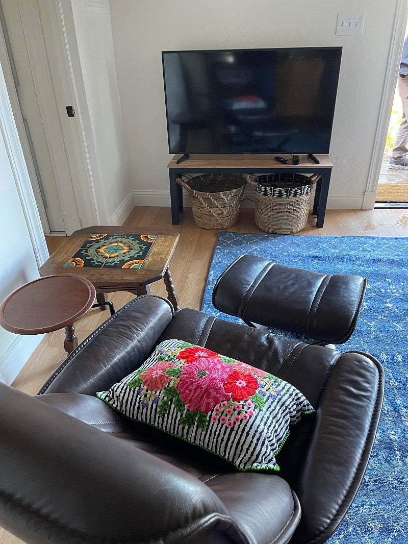 I love these charming 1940's tile tables - many think they are Mexican tiles, but they are from the famous tile companies in Catalina and Santa Barbara. No need for a coaster on these!  Big baskets are for a cuddly throw and books & magazines.  