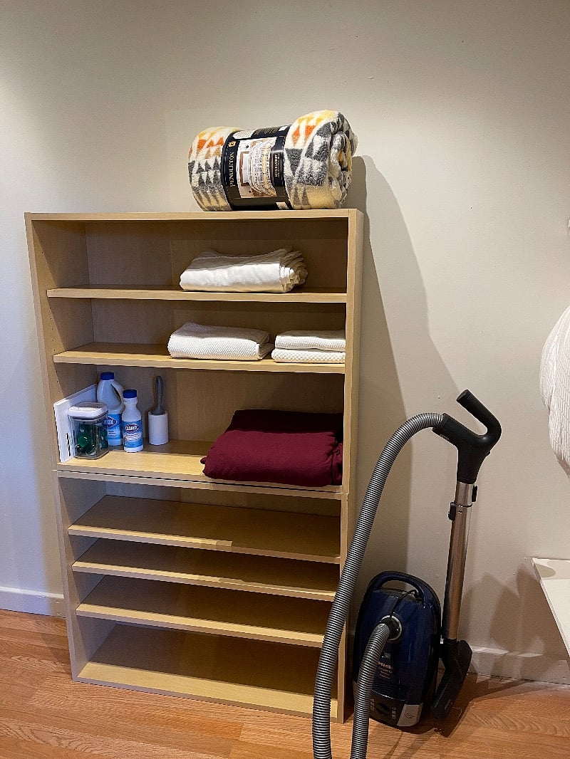 Walk in closet has loads of room for spare sheets, blankets, laundry & cleaning supplies.  New vacuum too. 