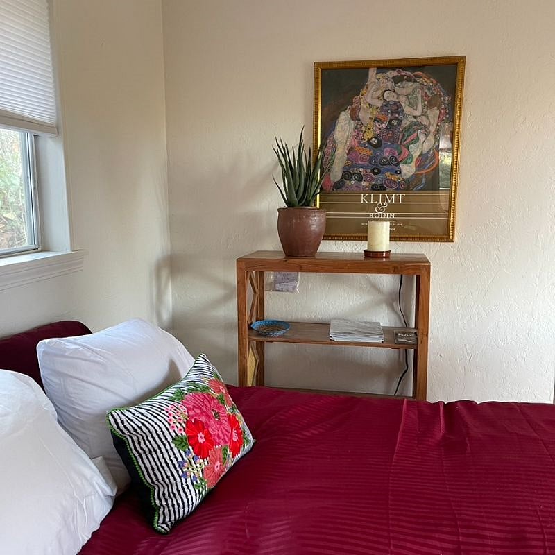 the right hand half of the house is a bedroom, bathroom and walk in closet. King size bed, all new linens. The room