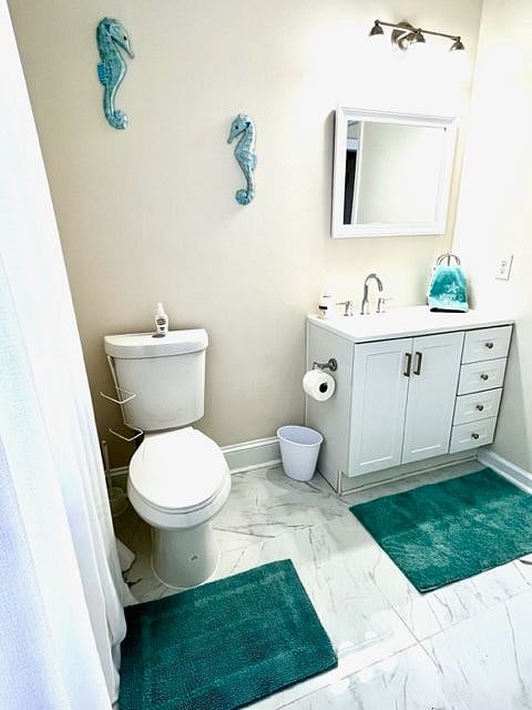 Half guest bath accessible in the main shared space