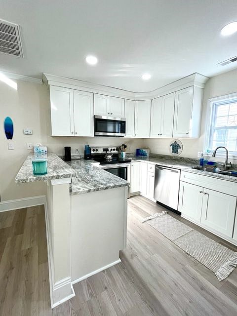 Fully stocked kitchen with brand new stainless appliances and plenty of space to store your favorite treats!