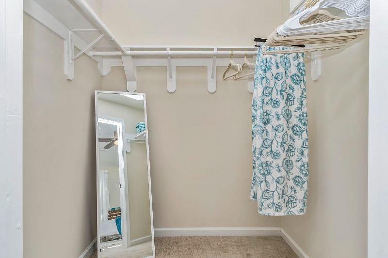 Walk-in Closet with full length mirror