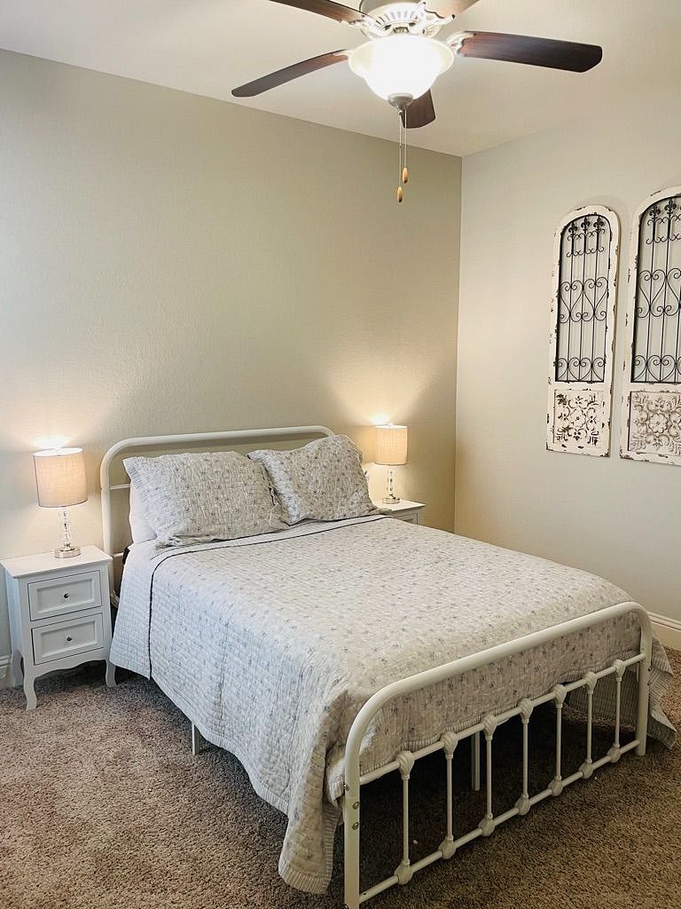 Secondary bedroom with full size bed downstairs