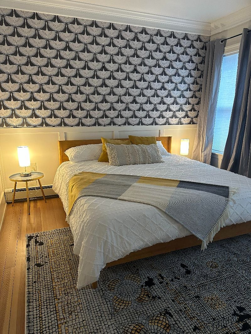 Bedroom #1 includes brand new King bed, dresser and small closet, blackout curtains, noise machine, full length mirror