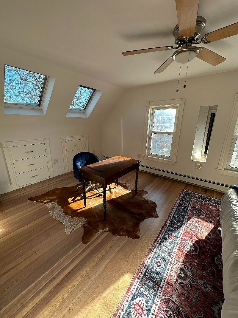 Bedroom #2- desk area with built in storage. skylights have remote controlled blackout shades.