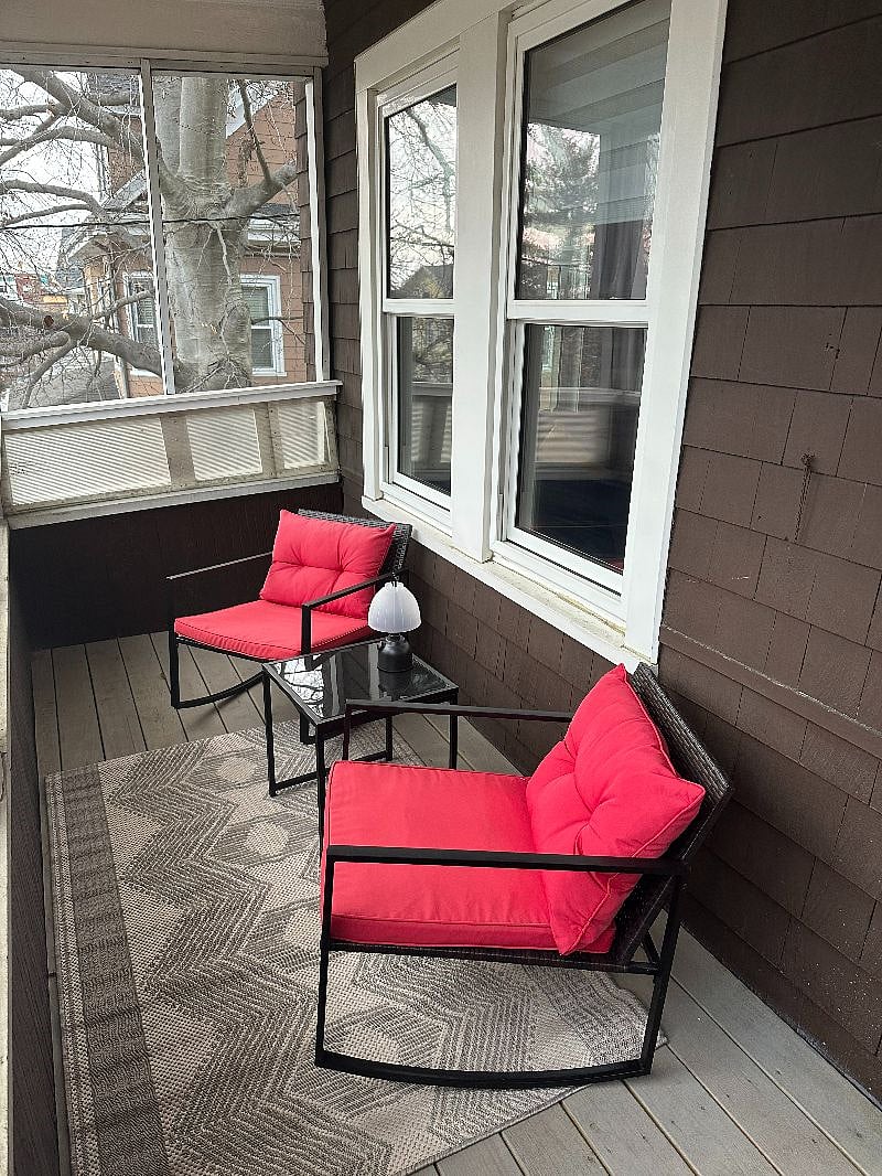 Screened in front porch. Entrance off of office