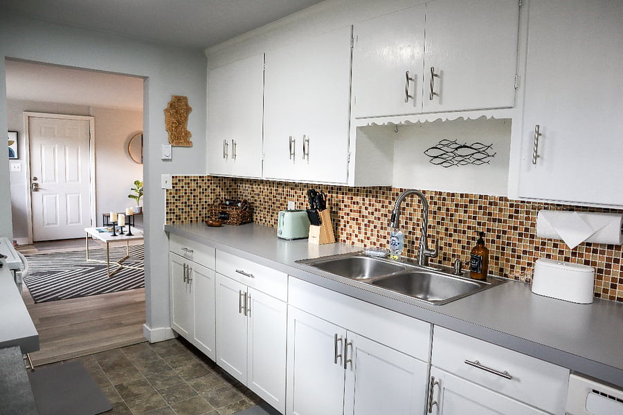 Roomy kitchen cabinets, sink