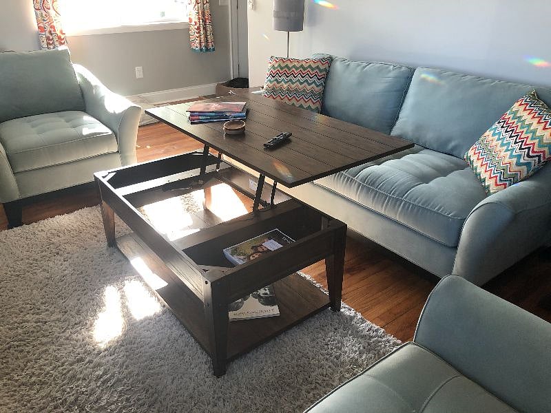 Living room table lifts up