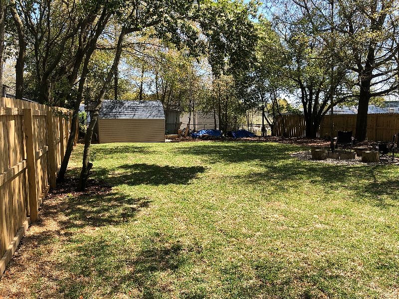 Backyard is completely fenced