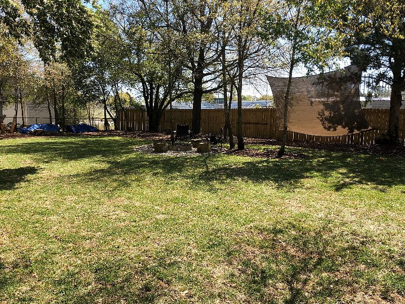 Backyard is completely fenced