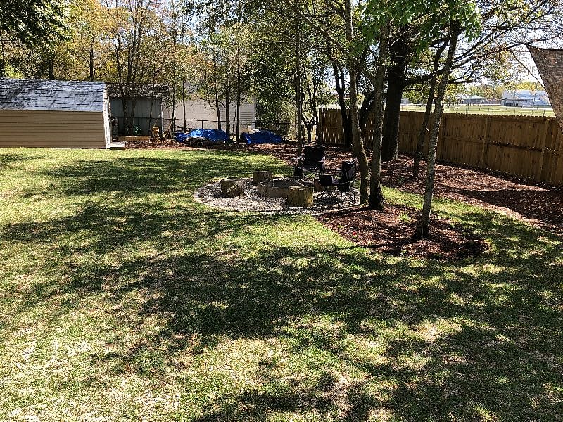 Backyard is completely fenced