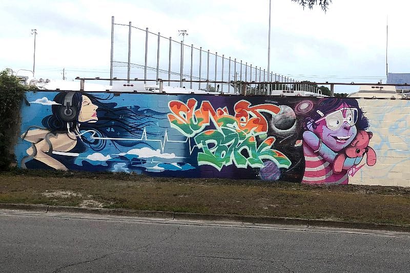 This is the gorgeous new mural going up on the ugly building beside the house. See the location section on the property description below on what I'm now calling "The Saga of the Ugly Building."
