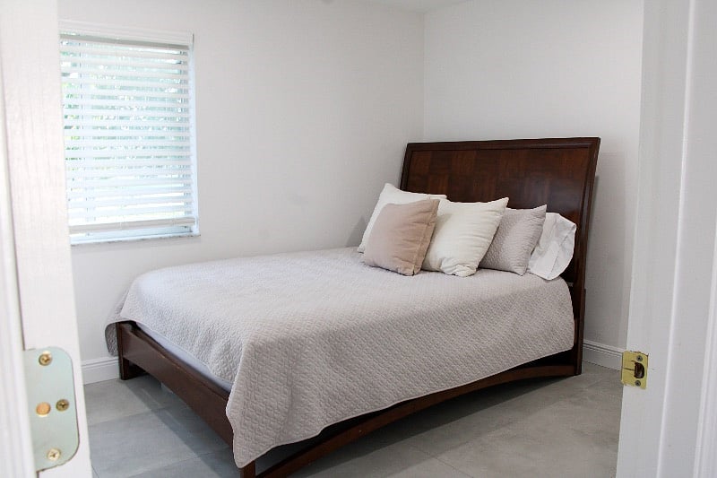 first guest bedroom; queen bed, closet