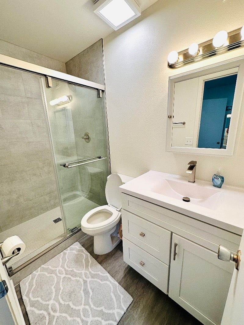 Primary bathroom inside the primary bedromm which is next to the walk in closet.