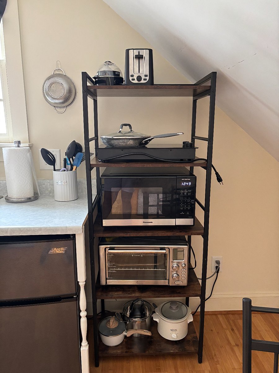 Everything you need to cook. Fancy cooktop, airfryer/oven, and microwave.