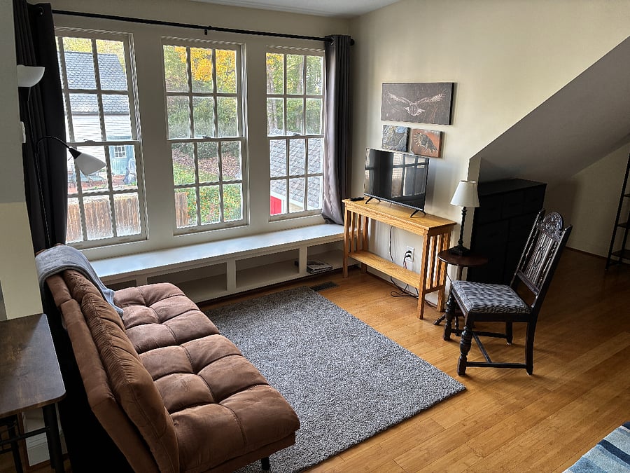 Cozy sitting area with nice view. Fantastic windows to bring all the natural light you need.