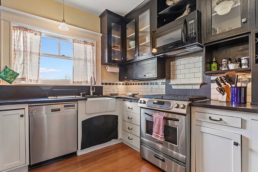 Full kitchen with stove and microwave