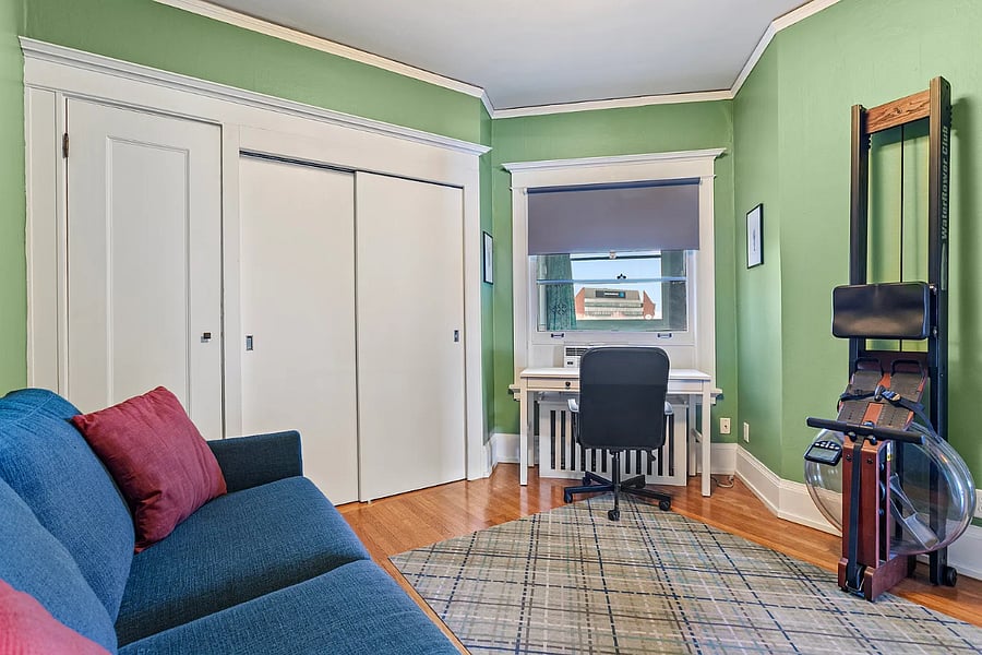 Office desk, water rower, and more large closet space