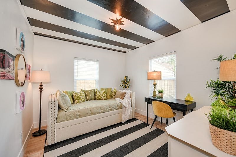 Downstairs secondary bedroom which can be a den, or guest room, pull out trundle day bed