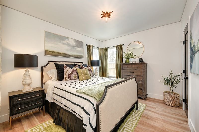 downstairs bedroom with queen bed