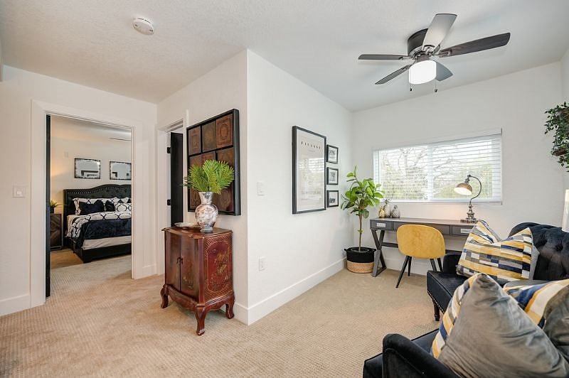 Upstairs features an office/loft/sitting area plus the primary suite and full bath
