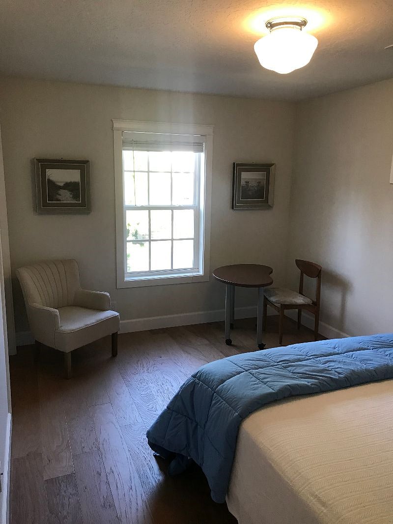 Bedroom #2 with rolling desk and view window.
