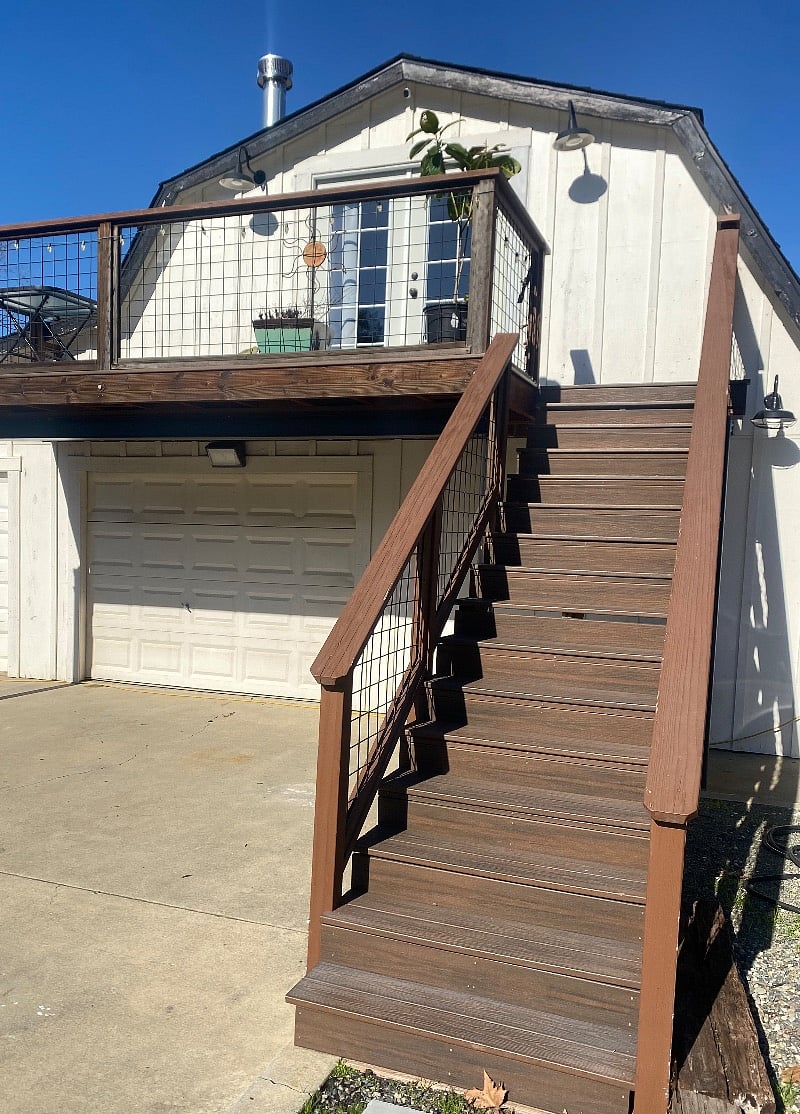 Step to enter the studio and parking space is next to this stairwell