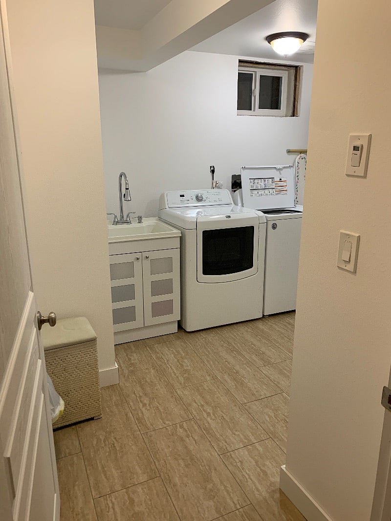 Large laundry room. Cabinets and counter is across from the washer/dryer.