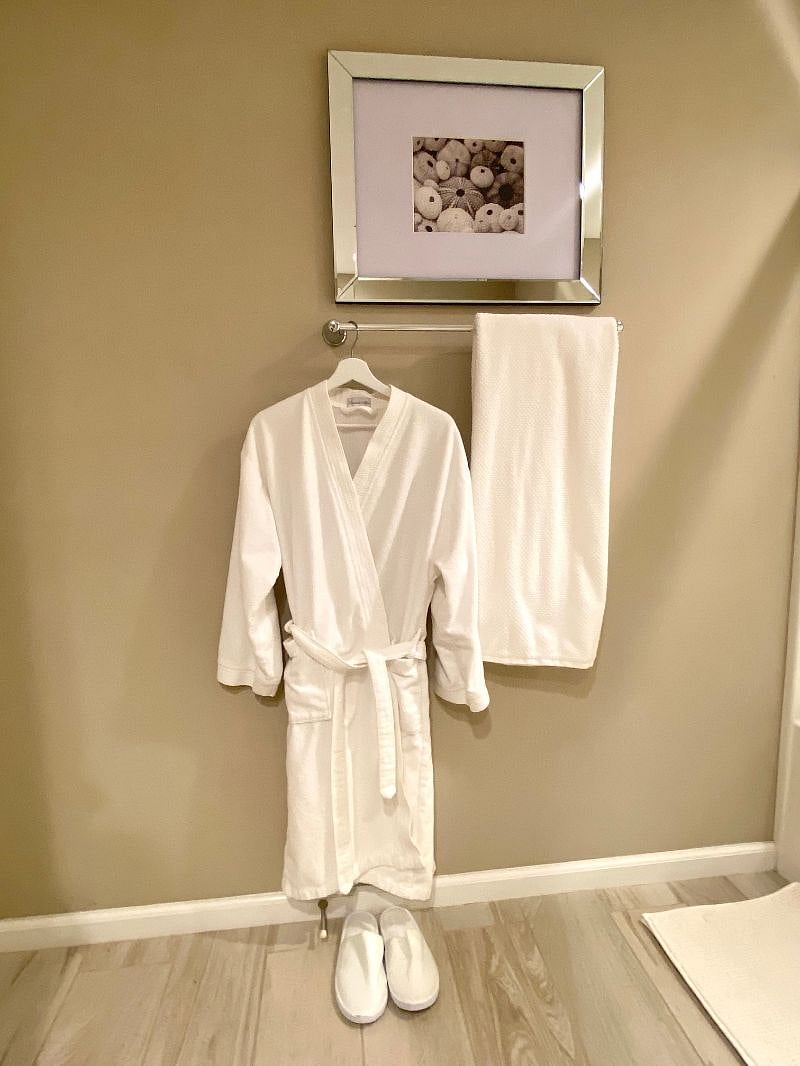 Cotton terry bathrobe and slippers will keep you warm after the shower.   