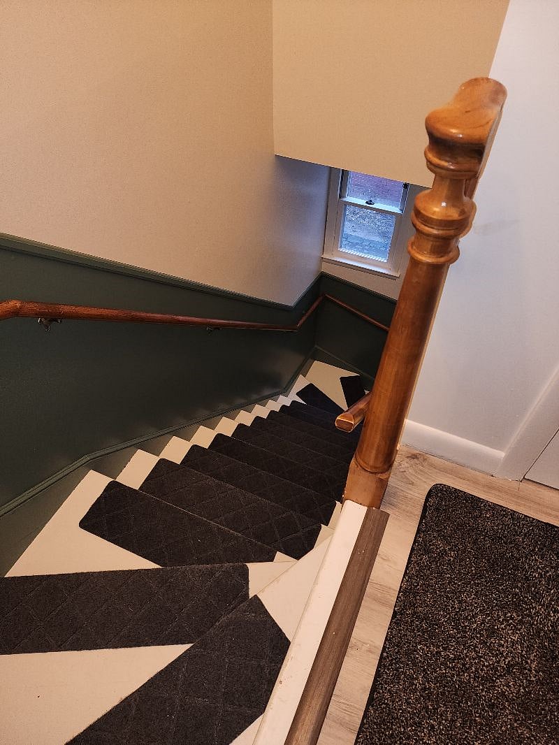 Side Door Stair Case Leading to the Door of Private Apartment