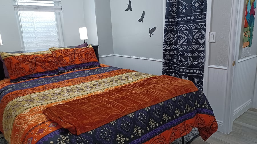 Bedroom, closet, and window