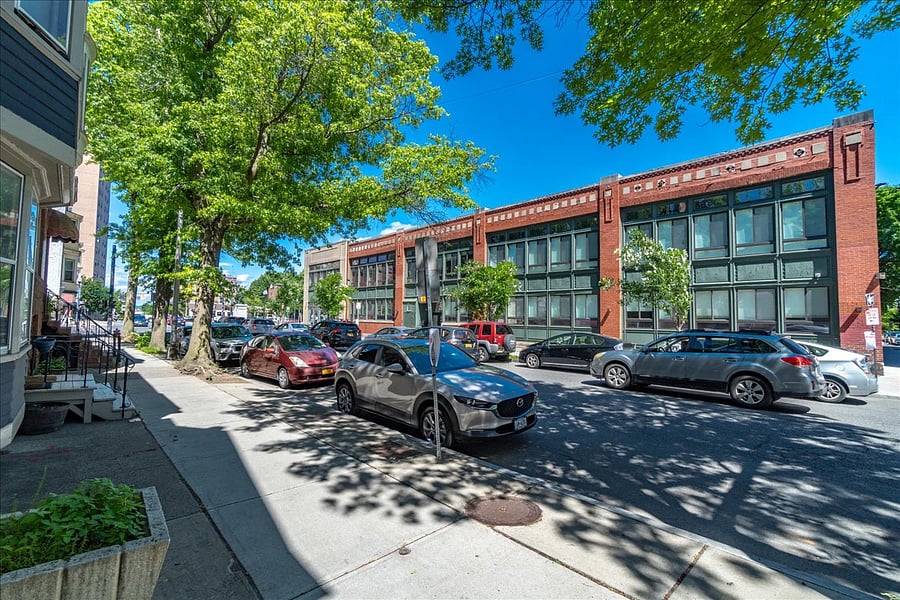 building exterior on street facing brownstones