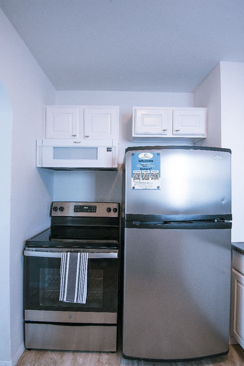Microwave, Stove, Oven, and Double Door Fridge