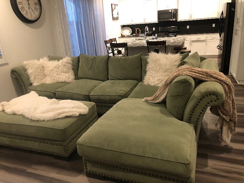 You will melt into this couch. It is the perfect couch to flop on, and just lounge in absolute comfort!! Soooo comfortable!