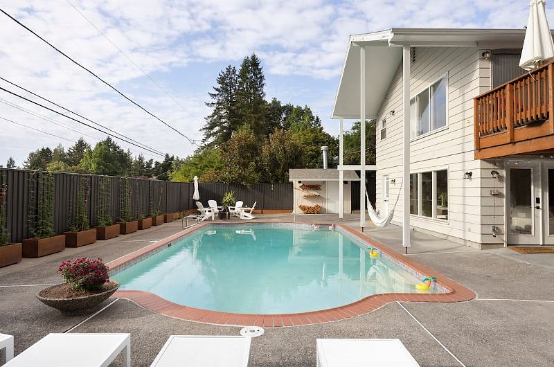 So many ways to enjoy the private pool area - tan on a lounger, nap in the hammock or hang out at the Adirondacks
