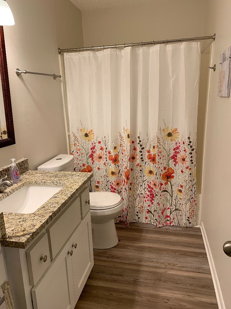 Full size bathroom with tub/shower combo. This bathroom is shared with the medium sized bedroom (if occupied)