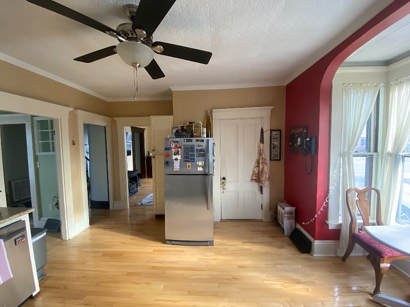 Kitchen includes closet/pantry, dishwasher, electric stovetop and oven, microwave, and coffee machine 