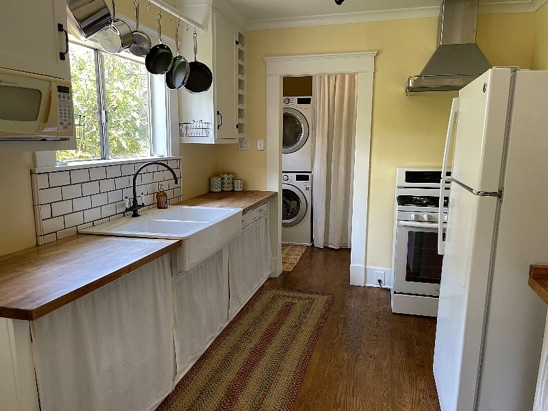 Kitchen sink and laundry room. ews