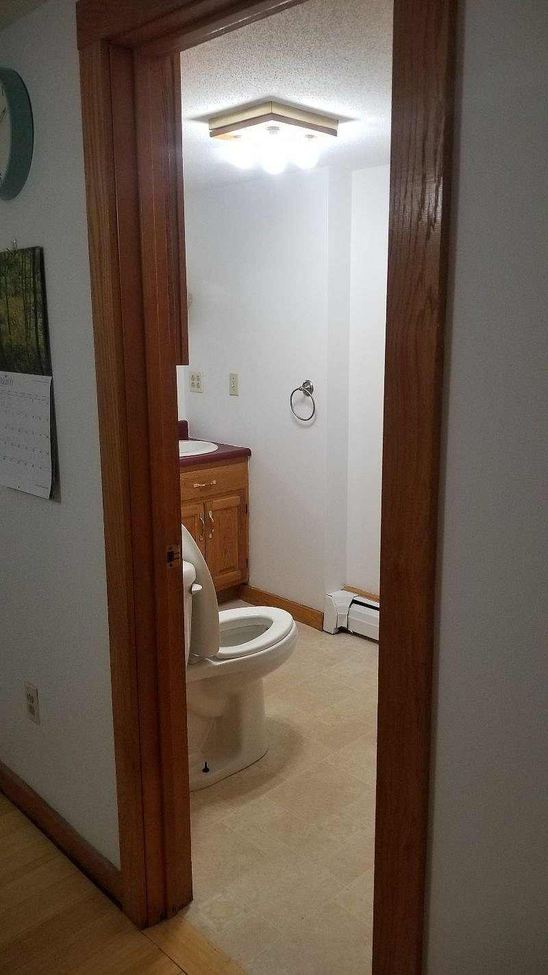 bathroom on the first floor next to the dining room